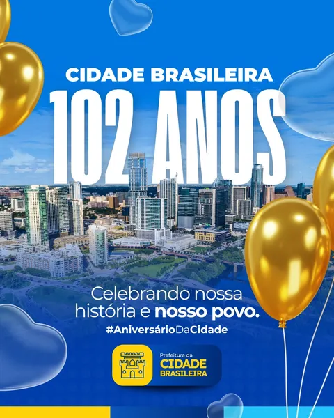 Post para Instagram anunciando o aniversário de 102 anos de uma cidade brasileira. O design é azul e amarelo, com balões dourados e azuis em formato de coração, e um fundo de paisagem urbana.